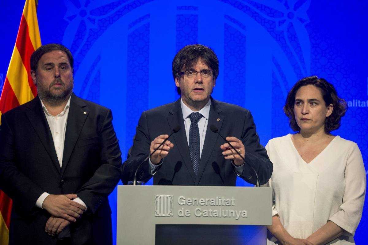 Junqueras, Puigdemont y Colau. Foto: EFE